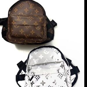 CHEWY VUITTON-
Designer-Inspired Doggie Backpack -
Comes in brown or silver